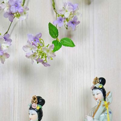 TƯỢNG SỨ TỨ CẦM MEN XANH
